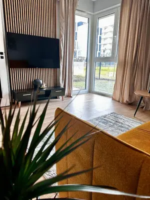 Telewizja i/lub zestaw kina domowego w obiekcie Apartament Jutrzenki