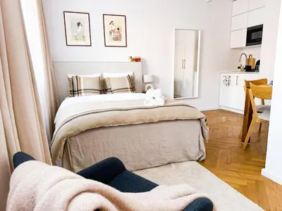 Łóżko lub łóżka w pokoju w obiekcie FLH Boutique Studio