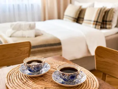 Łóżko lub łóżka w pokoju w obiekcie FLH Boutique Studio