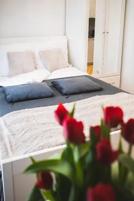 Łóżko lub łóżka w pokoju w obiekcie Great sleep in the heart of Warsaw + WiFi + washing machine