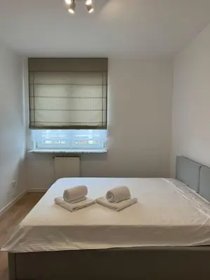 Łóżko lub łóżka w pokoju w obiekcie Glamour Apartment in Ochota