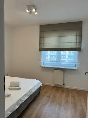 Łóżko lub łóżka w pokoju w obiekcie Glamour Apartment in Ochota