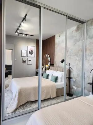 Łóżko lub łóżka w pokoju w obiekcie Luksusowy Apartament Bliska Wola SABA