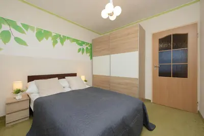 Łóżko lub łóżka w pokoju w obiekcie Apartment with Balcony for 2 People in Warsaw by Noclegi Renters