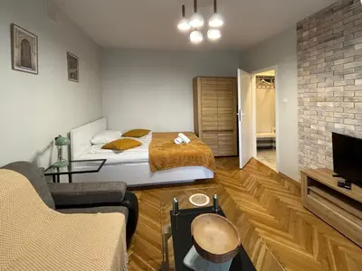 Łóżko lub łóżka w pokoju w obiekcie Fancy Life Apartment