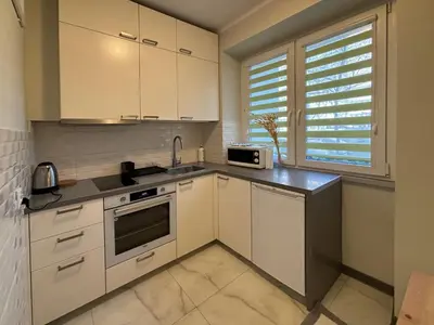 Kuchnia lub aneks kuchenny w obiekcie Fancy Life Apartment