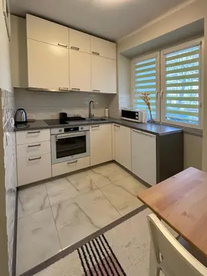 Kuchnia lub aneks kuchenny w obiekcie Fancy Life Apartment