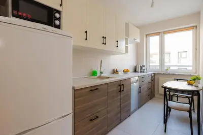 Kuchnia lub aneks kuchenny w obiekcie ShortStayPoland Aleja Stanów Zjednoczonych (B159)