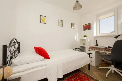 Łóżko lub łóżka w pokoju w obiekcie Autumn Apartment with Balcony and Two Bedrooms by Noclegi Renters