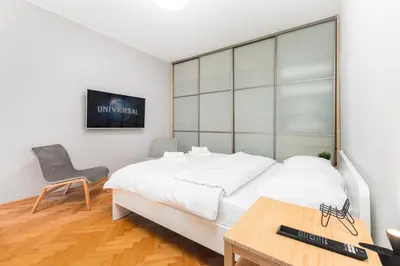 Łóżko lub łóżka w pokoju w obiekcie Apartament Wspólna by Your Freedom