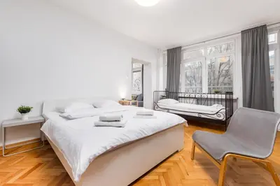 Łóżko lub łóżka w pokoju w obiekcie Apartament Wspólna by Your Freedom