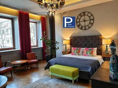 Łóżko lub łóżka w pokoju w obiekcie SleepWell Ordynacka