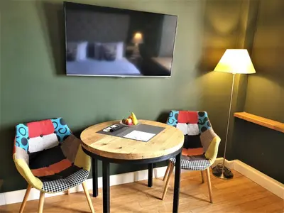 Telewizja i/lub zestaw kina domowego w obiekcie SleepWell Ordynacka