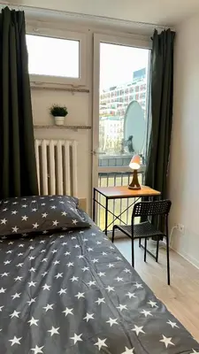 Łóżko lub łóżka w pokoju w obiekcie Rooms in Warsaw - G5