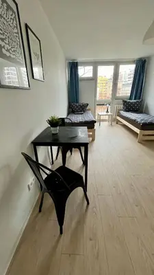 Część wypoczynkowa w obiekcie Rooms in Warsaw - G5