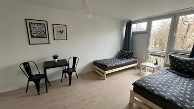 Łóżko lub łóżka w pokoju w obiekcie Rooms in Warsaw - G5