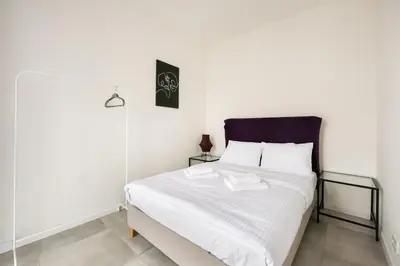 Łóżko lub łóżka w pokoju w obiekcie Business Mokotów Park 111 Apartment