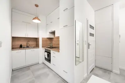 Kuchnia lub aneks kuchenny w obiekcie Business Mokotów Park 111 Apartment