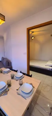 Łóżko lub łóżka w pokoju w obiekcie Versatile Apartment-Unique Design Free Parking