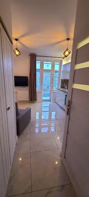 Telewizja i/lub zestaw kina domowego w obiekcie Versatile Apartment-Unique Design Free Parking