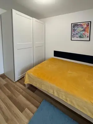 Łóżko lub łóżka w pokoju w obiekcie Smooth Life Apartment