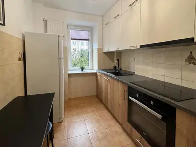 Kuchnia lub aneks kuchenny w obiekcie Smooth Life Apartment