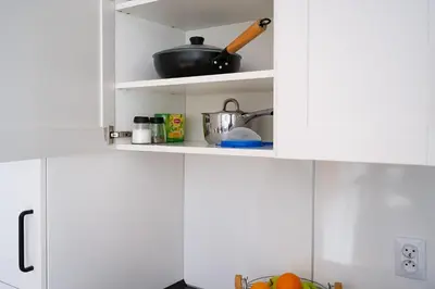 Kuchnia lub aneks kuchenny w obiekcie Marszałkowska 83 - Stacja metra 500m - Dworzec centrlany 1km - Better rental