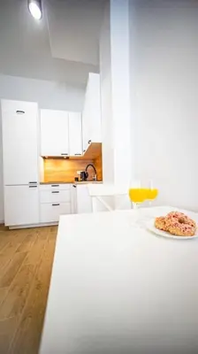 Kuchnia lub aneks kuchenny w obiekcie Stylish apartment in Warsaw