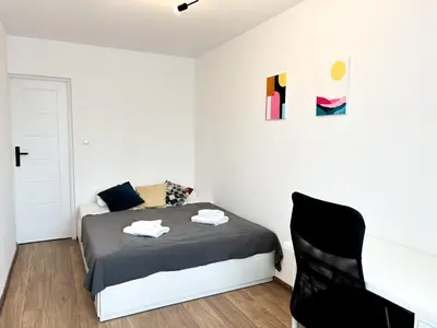 Łóżko lub łóżka w pokoju w obiekcie Next Life Apartament