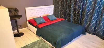Łóżko lub łóżka w pokoju w obiekcie Green Apartment