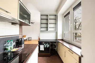 Kuchnia lub aneks kuchenny w obiekcie Metro Ratusz Arsenał Comfort Studio