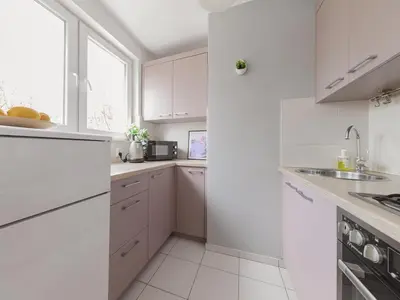 Kuchnia lub aneks kuchenny w obiekcie Cardamon Apartment City Center
