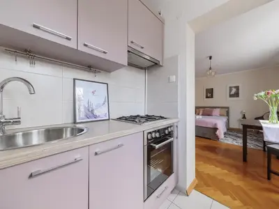 Kuchnia lub aneks kuchenny w obiekcie Cardamon Apartment City Center