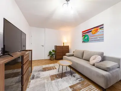 Telewizja i/lub zestaw kina domowego w obiekcie Latte Apartment 2 Closed Rooms City Center