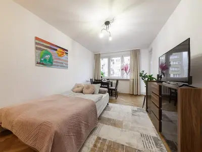 Telewizja i/lub zestaw kina domowego w obiekcie Latte Apartment 2 Closed Rooms City Center