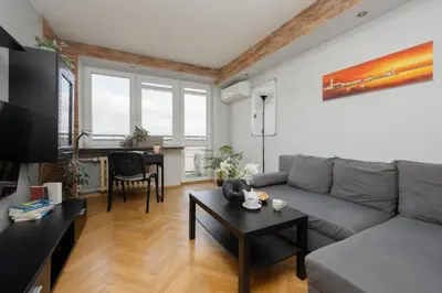 Część wypoczynkowa w obiekcie Salezego Apartment near PGE Narodowy Warsaw by Noclegi Renters
