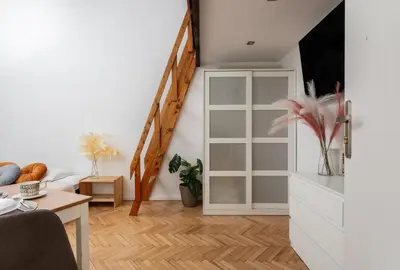 Telewizja i/lub zestaw kina domowego w obiekcie The Central Loft Chmielna