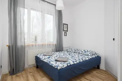 Łóżko lub łóżka w pokoju w obiekcie Metro Pole Mokotowskie