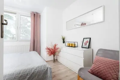 Łóżko lub łóżka w pokoju w obiekcie Cupcake Apartment Mokotow