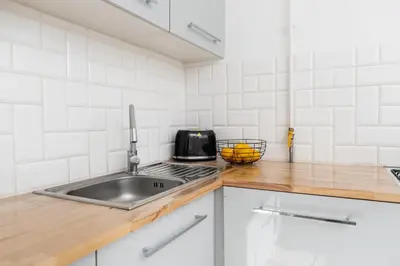 Kuchnia lub aneks kuchenny w obiekcie Cupcake Apartment Mokotow