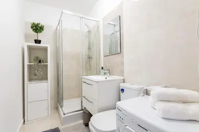 Łazienka w obiekcie Cupcake Apartment Mokotow