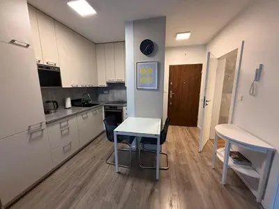 Kuchnia lub aneks kuchenny w obiekcie Modern apartment near to the Chopin's airport Cybernetyki 2A
