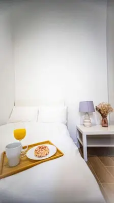 Łóżko lub łóżka w pokoju w obiekcie Lovely apartment in Warsaw
