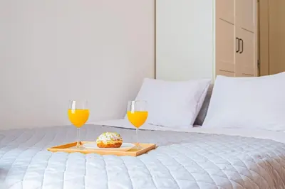 Łóżko lub łóżka w pokoju w obiekcie Komfortowy Apartament w Centrum
