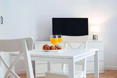 Telewizja i/lub zestaw kina domowego w obiekcie Komfortowy Apartament w Centrum