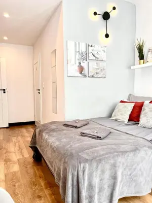 Łóżko lub łóżka w pokoju w obiekcie Special 1 Bed room Condo Warszawa Center