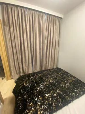 Łóżko lub łóżka w pokoju w obiekcie Wiktoryn 6 piękne nowe apartamenty z dużymi balkonami