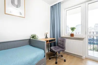 Łóżko lub łóżka w pokoju w obiekcie Blue Matcha Premium Apartment Okopowa