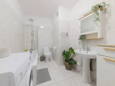 Łazienka w obiekcie Sugar Plum Apartment Bielany