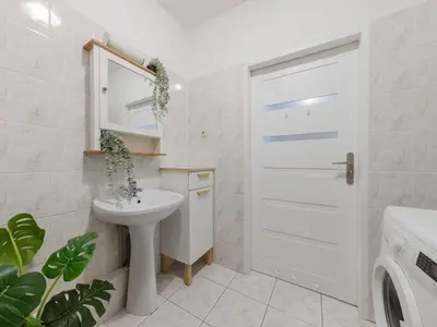 Łazienka w obiekcie Sugar Plum Apartment Bielany